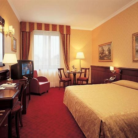 Atahotel Executive Милано Стая снимка