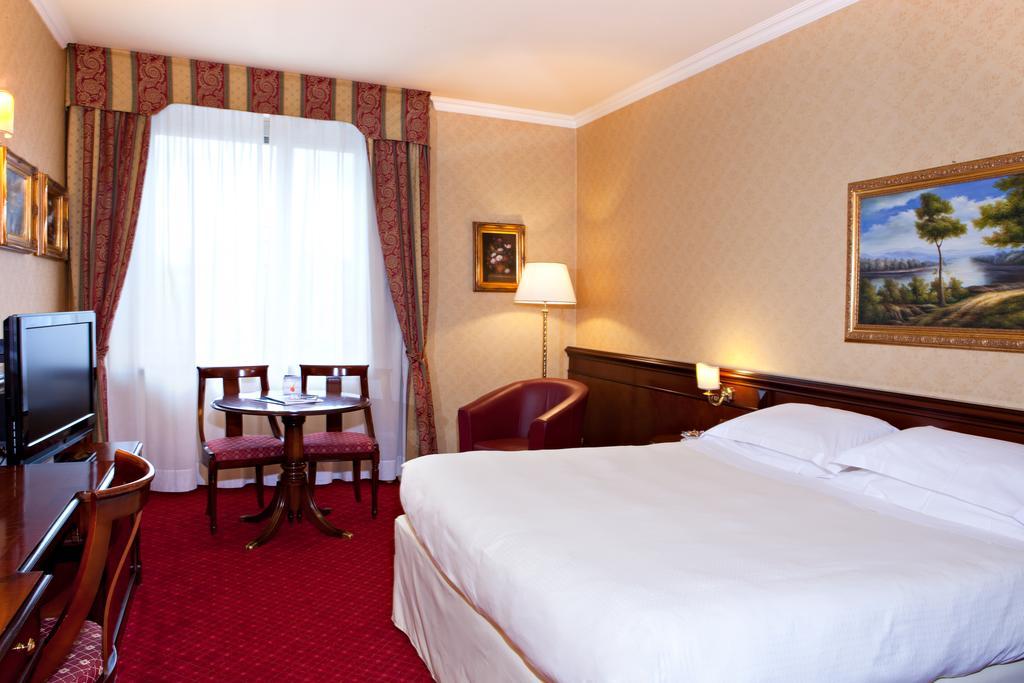 Atahotel Executive Милано Стая снимка